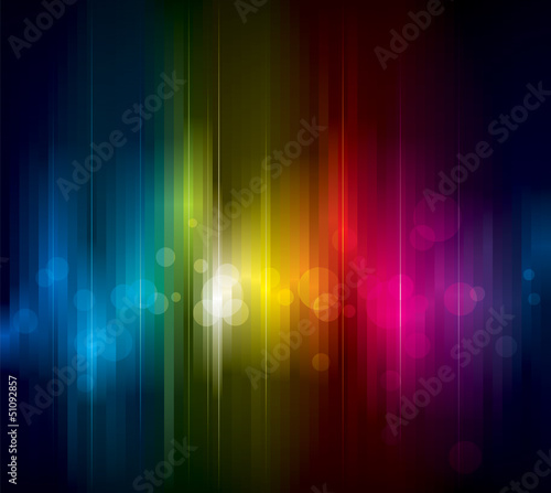 Abstract colorful light on dark background.