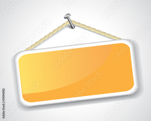 sign hanging on a nail
