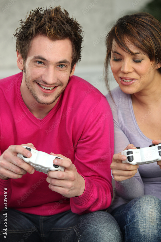 Fototapeta premium Young playing with console
