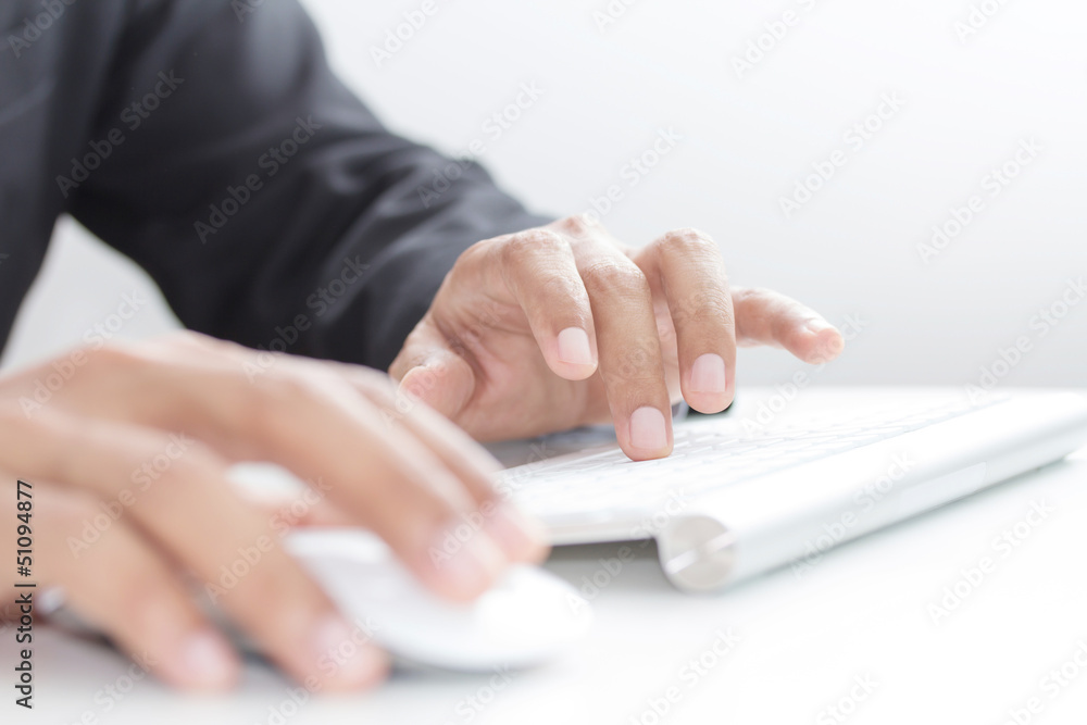 Hands working on the keyboard Hands working on the keyboard