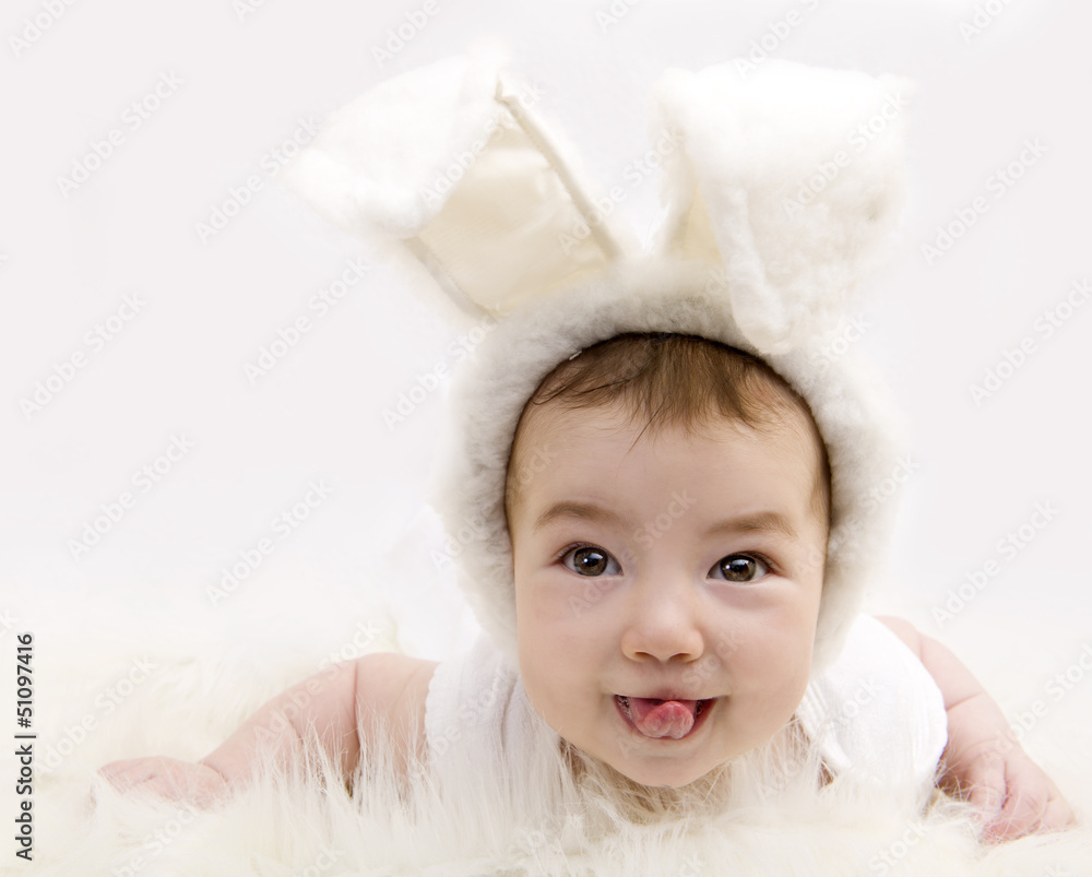 Baby in rabbit costume on white background Baby in rabbit costume on white background