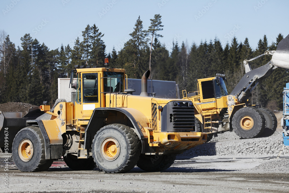 heavy duty trucks working inside gravel industry pit heavy duty trucks working inside gravel industry pit