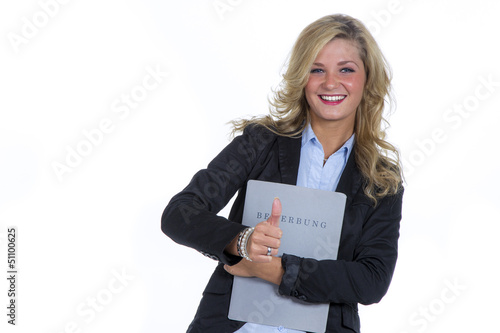 Blonde Frau in Businessoutfit mit Bewerbungsmappe photo