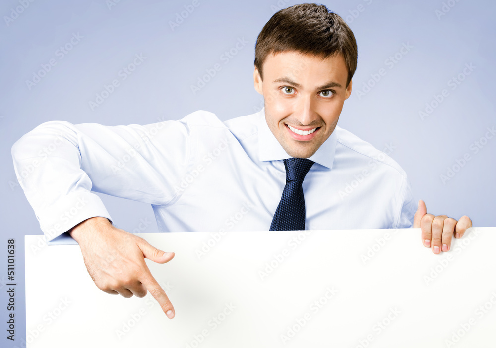 Business man showing blank signboard, on violet Business man showing blank signboard, on violet