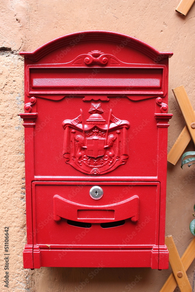 Red reproduction of wall mailbox of italian 
