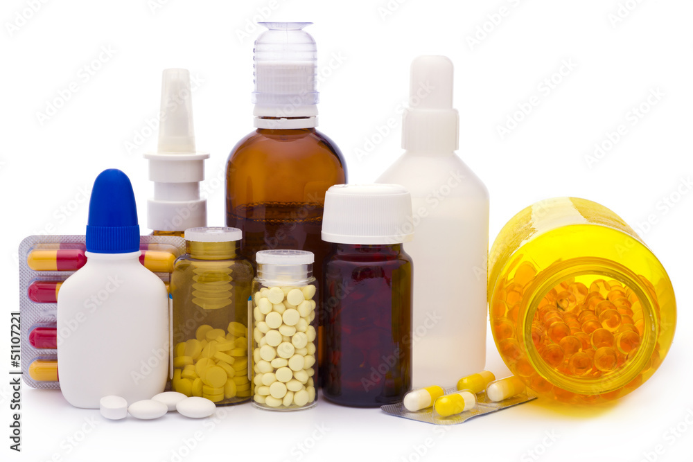 Composition of medicine bottles and pills isolated on white Composition of medicine bottles and pills isolated on white