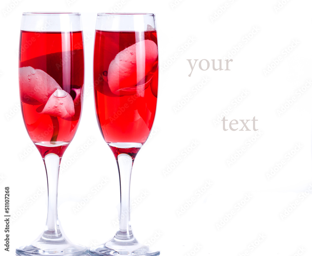glass with red wine and an orchid glass with red wine and an orchid