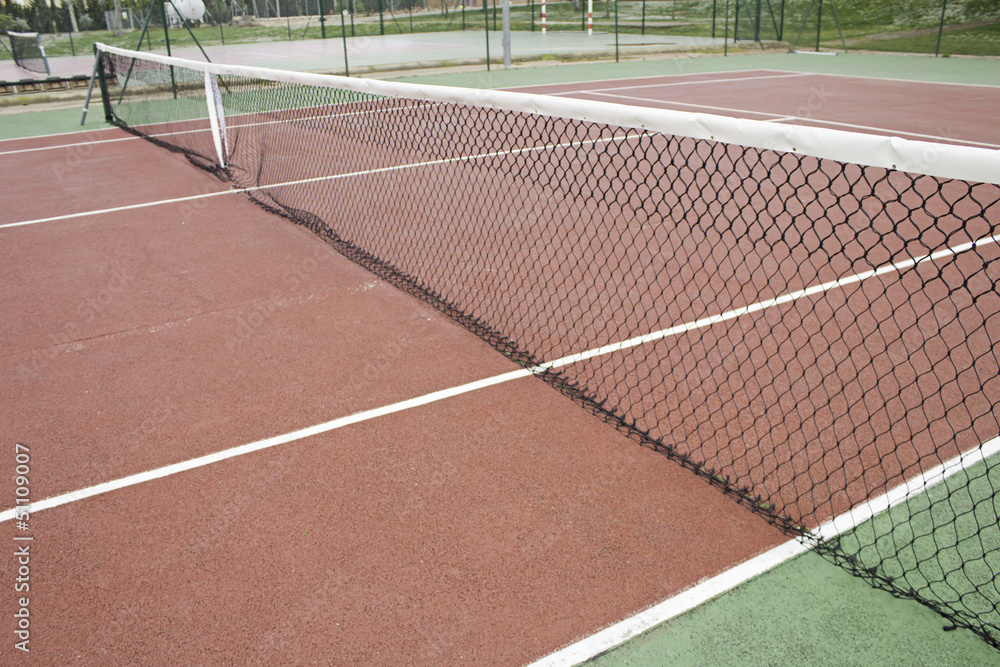 Fototapeta premium Network and ground tennis court