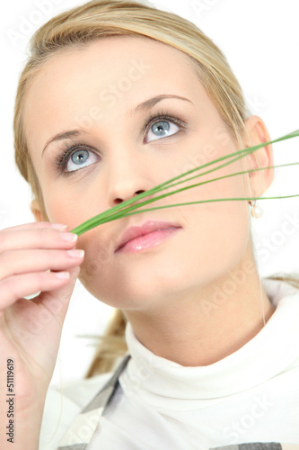 Woman smelling spices