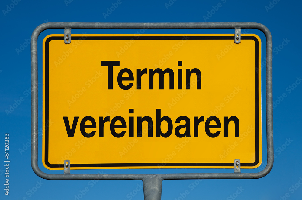 Ortsschild mit blauem Himmel TERMIN VEREINBAREN Ortsschild mit blauem Himmel TERMIN VEREINBAREN