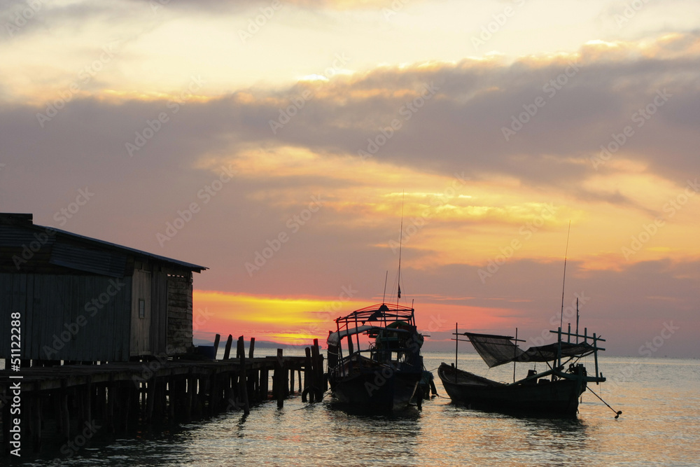 Silhouette of traditional fishing boats at sunrise, Koh Rong isl