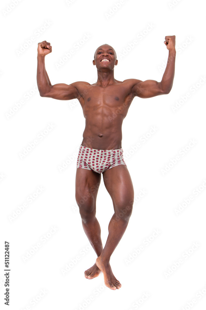 Healthy muscular man is happy with his body