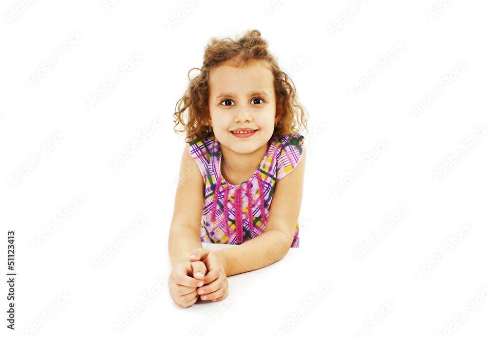 Blonde kid little student girl portrait smiling on a desk Blonde kid little student girl portrait smiling on a desk
