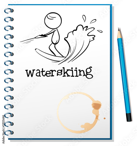 A notebook with a sketch of a person waterskiing