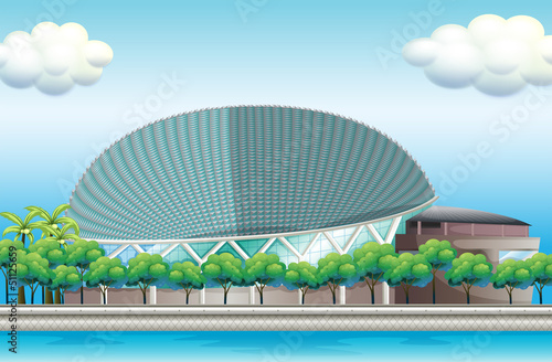 A stadium surrounded with trees