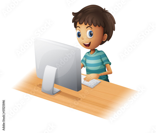 A boy playing computer