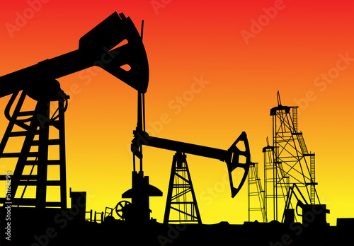 Silhouette of oil derrick