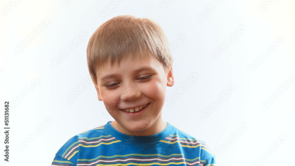 The boy laughs. Joyful happy child. The boy laughs. Joyful happy child.