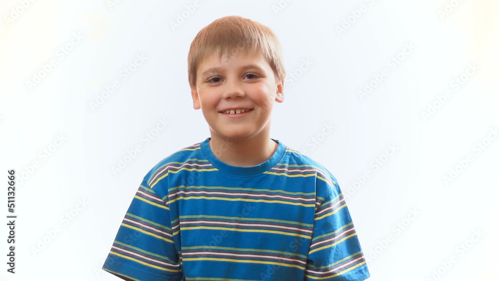 child is happy and clapping . Happy boy, a schoolboy child is happy and clapping . Happy boy, a schoolboy