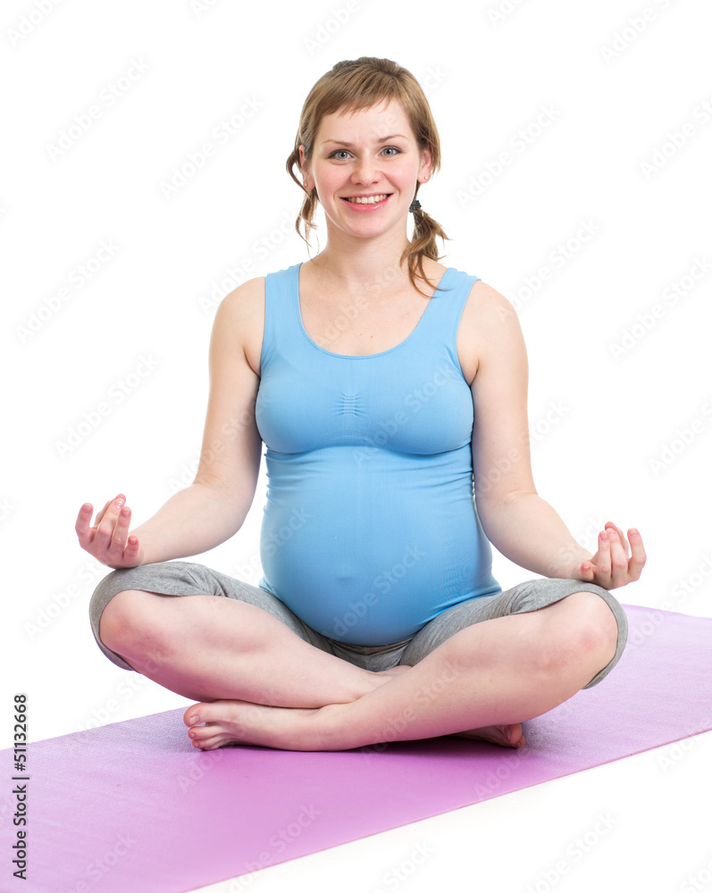 Pregnant woman doing yoga isolated on white Pregnant woman doing yoga isolated on white