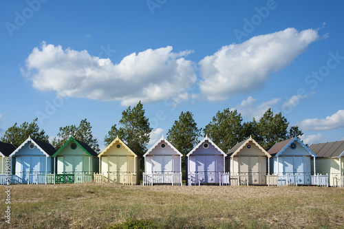 Colorful Beach Huts at West Mersea, Essex, UK. © mparratt