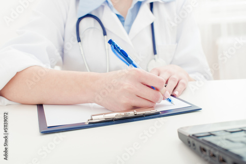 Filling out medical document