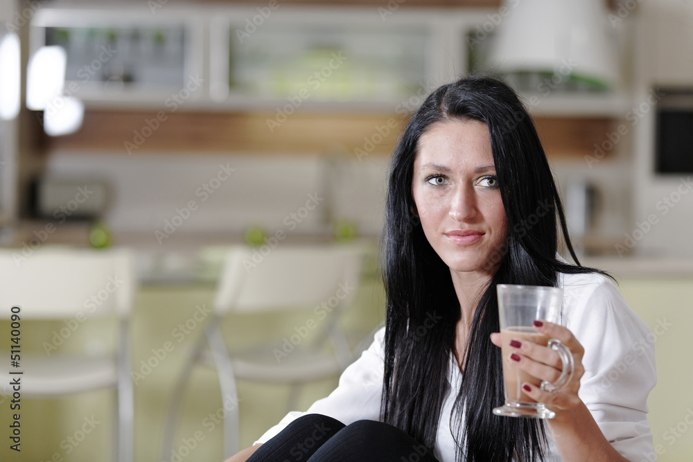 Woman taking a coffee break Woman taking a coffee break
