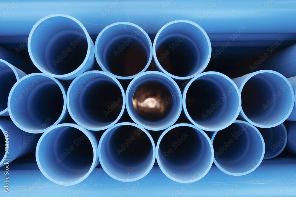 PVC pipes stacked in construction site