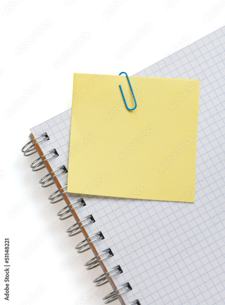note paper and notebook on white note paper and notebook on white