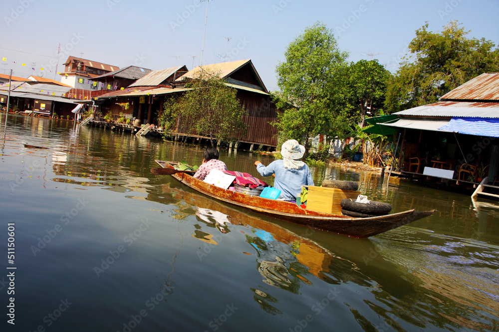 Traditional transportation, wooden boat in canal, Thailand. Traditional transportation, wooden boat in canal, Thailand.