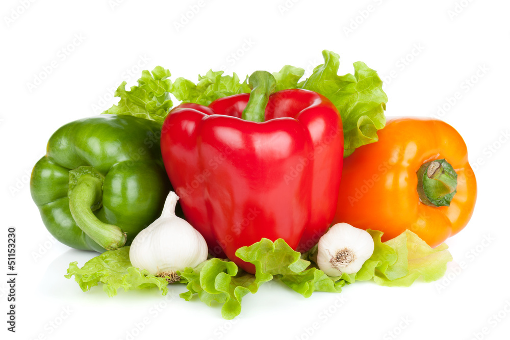 Colorful bell peppers with garlic and lettuce Colorful bell peppers with garlic and lettuce