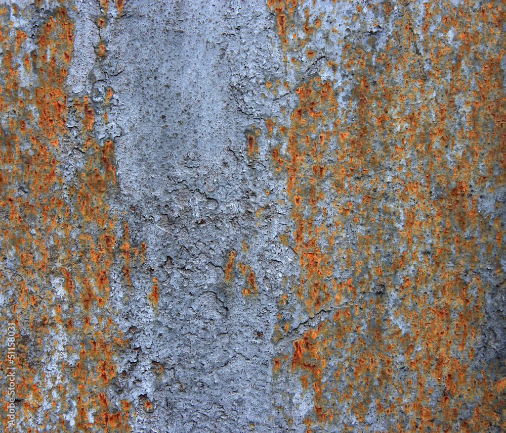 A rusty old metal plate with cracked black gloss paint A rusty old metal plate with cracked black gloss paint