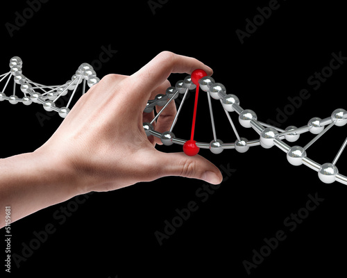 Man's hand holding molecules structure isolated on black background