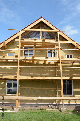 new wooden rural house thermal insulation with rockwool
