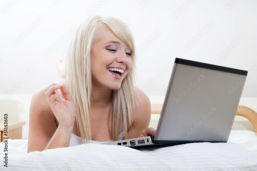 Young woman browsing internet. Selective focus Young woman browsing internet. Selective focus