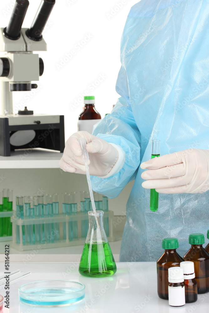 Scientist conducting research in laboratory close up Scientist conducting research in laboratory close up