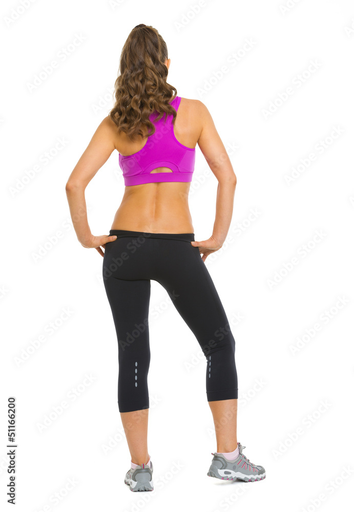 Full length portrait of fitness young woman. rear view Full length portrait of fitness young woman. rear view