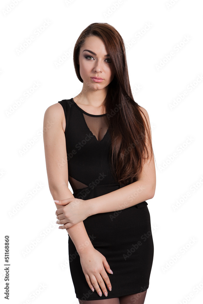 Beautiful business woman in black dress over white background Beautiful business woman in black dress over white background