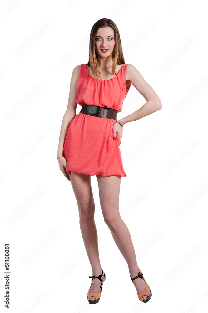 Beautiful female fashion model posing in pink dress Beautiful female fashion model posing in pink dress