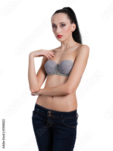 Beautiful sexy topless woman in blue jeans, isolated on white ba