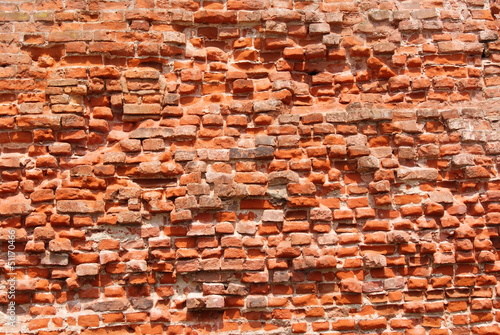 The red brick wall photo
