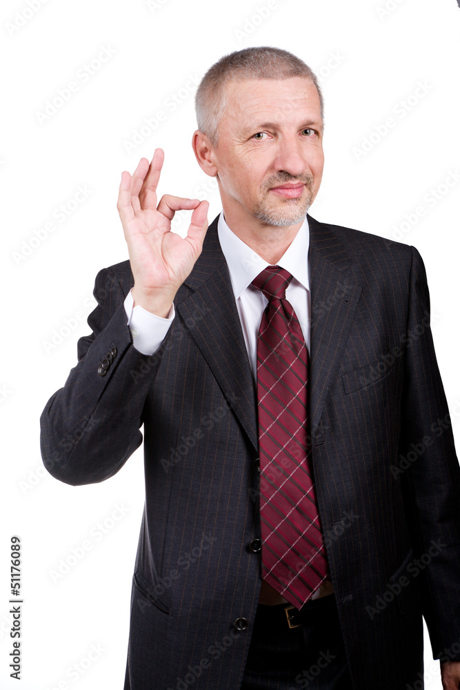 Businessman showing OK gesture Businessman showing OK gesture