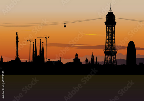 Barcelona skyline silhouette with sunset sky