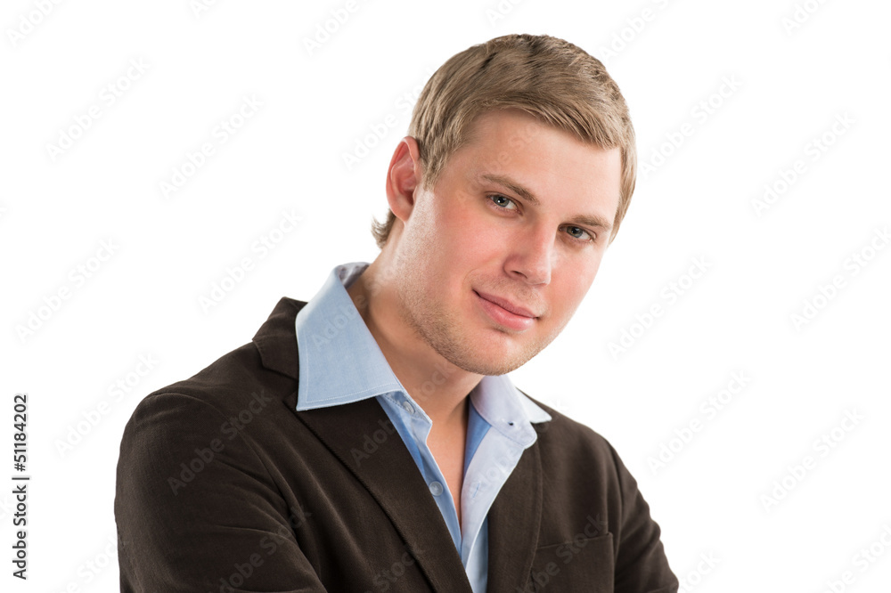A young executive looking at camera confidently while isolated o A young executive looking at camera confidently while isolated o