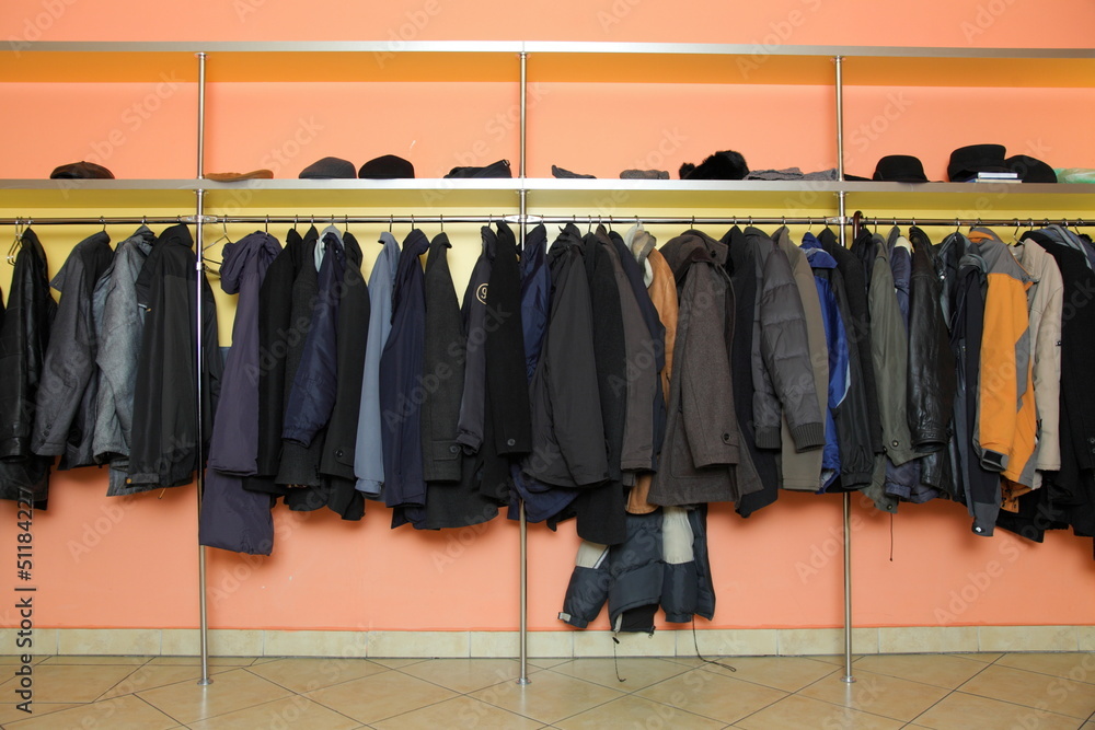 © Voyagerix - Many clothes in cloakroom