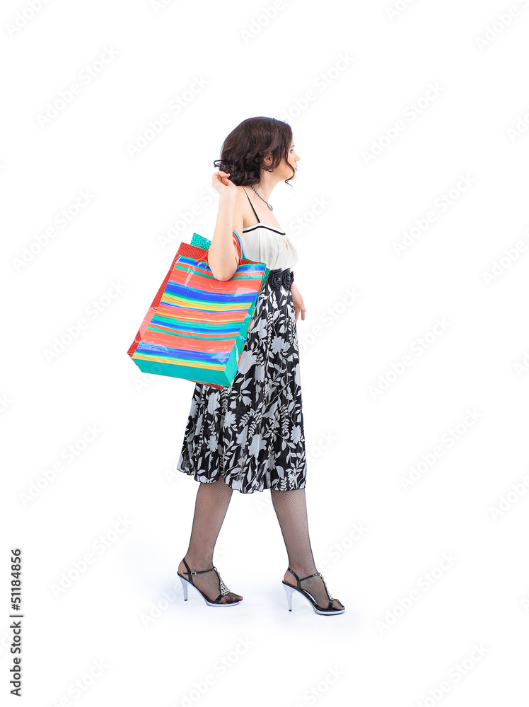 Happy young adult girl, with color-coded bags. Happy young adult girl, with color-coded bags.