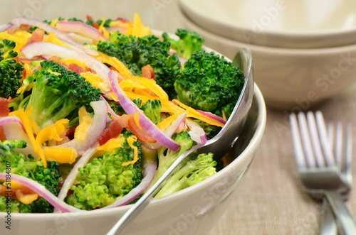 Broccoli salad with bacon, cheese and red onion