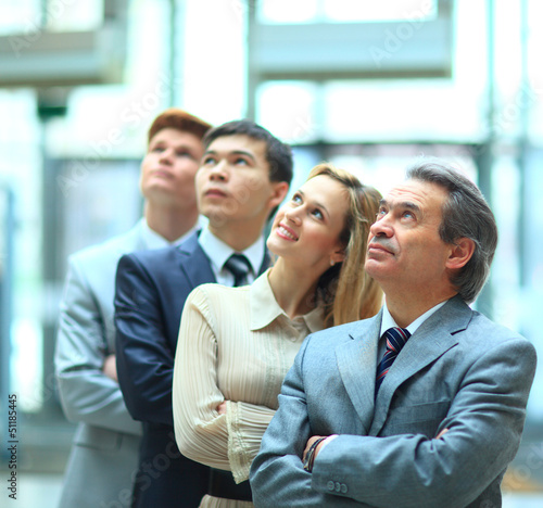 Happy smiling business team standing