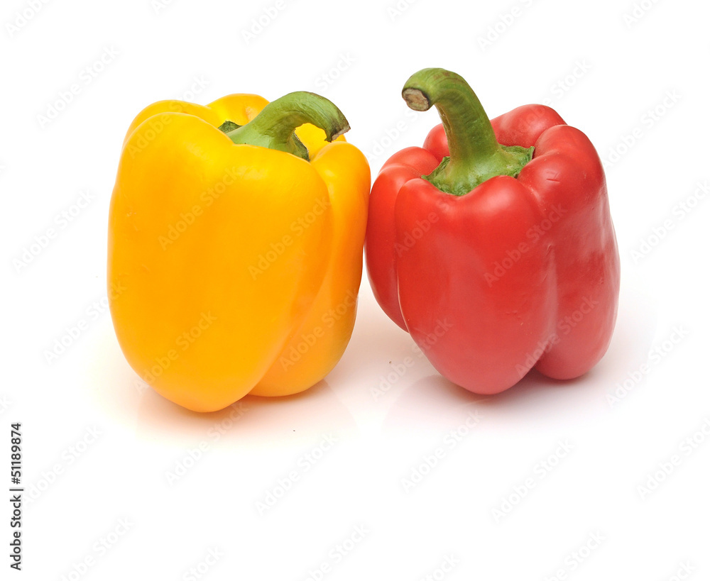 fresh yellow and red bell peppers isolated on white fresh yellow and red bell peppers isolated on white