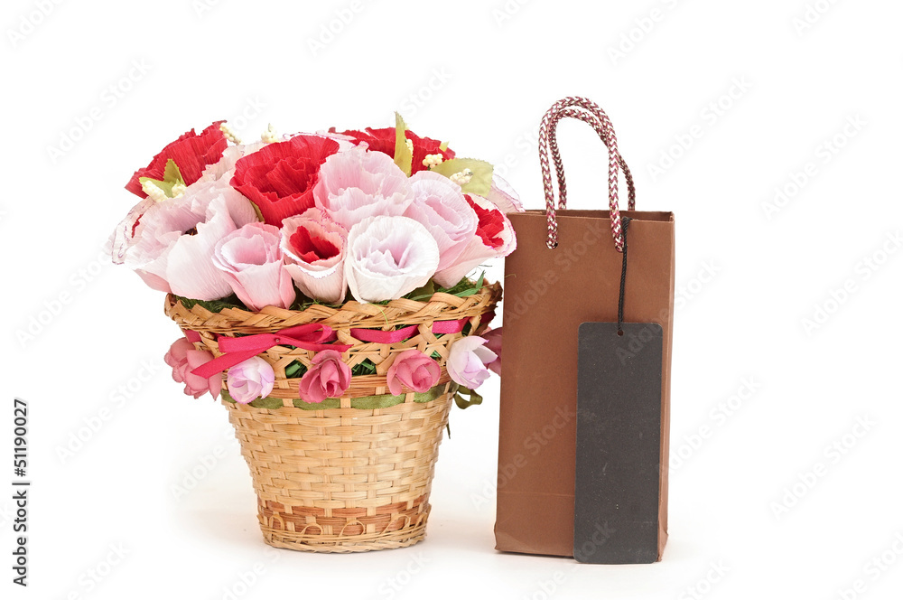 Paper flower in a basket with shopping bag